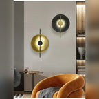 Concave Disc Reflector Wall Sconce – Moluxen – Lifestyle View, Black and Golden