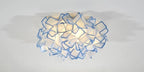 Lumero chandelier, blue-edge acrylic petals, illuminated
