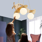 Wood Aircraft Chandelier Avirath — Natural Wood Finish, Children's Room