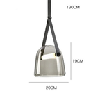 Elorvix pendant light, smoke gray glass shade, dimensions 20cm diameter x 19cm height, adjustable leather strap up to 190cm