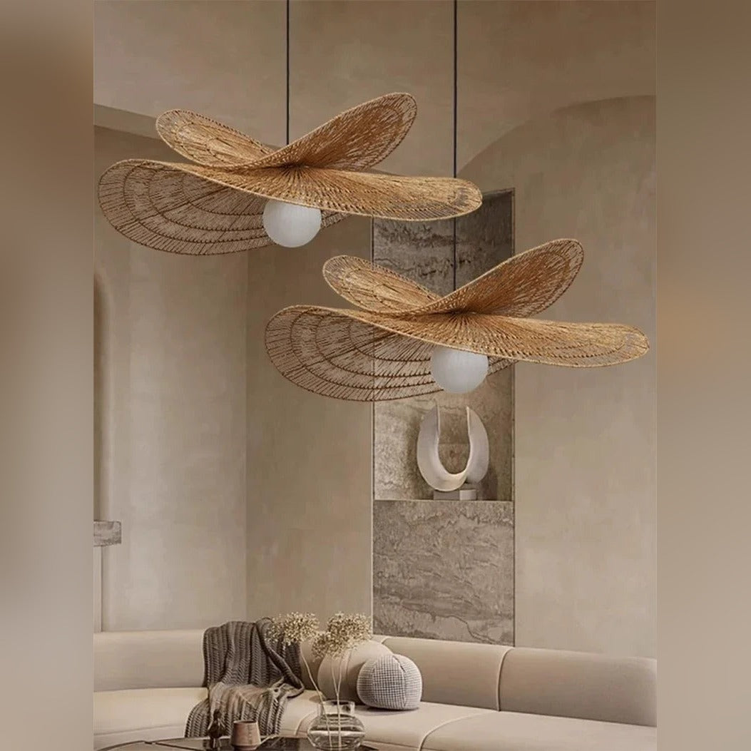 Handwoven Rattan Wing Pendant Light Mtavion – Lifestyle over living room sofa