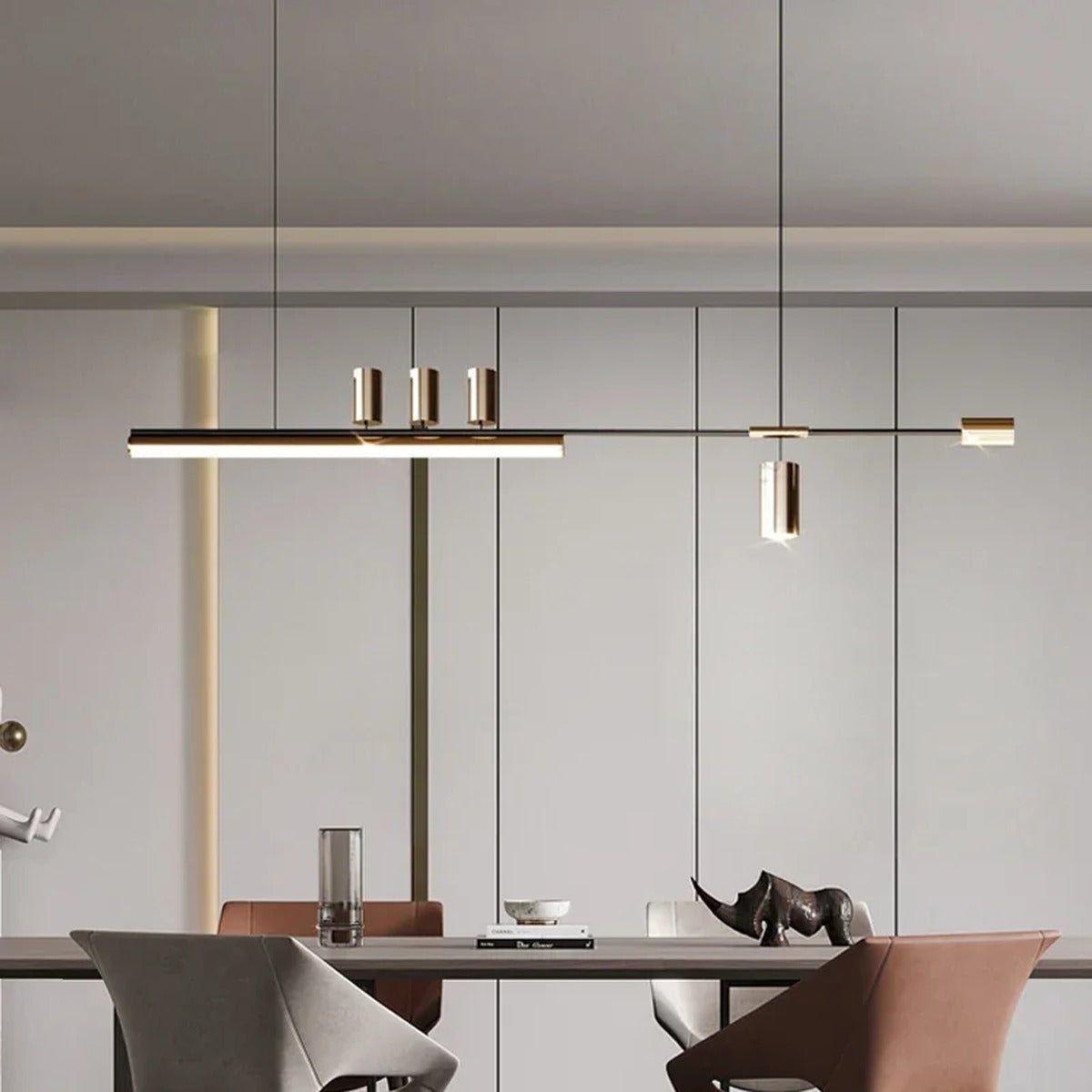 Orvantis linear bar chandelier — dining table view