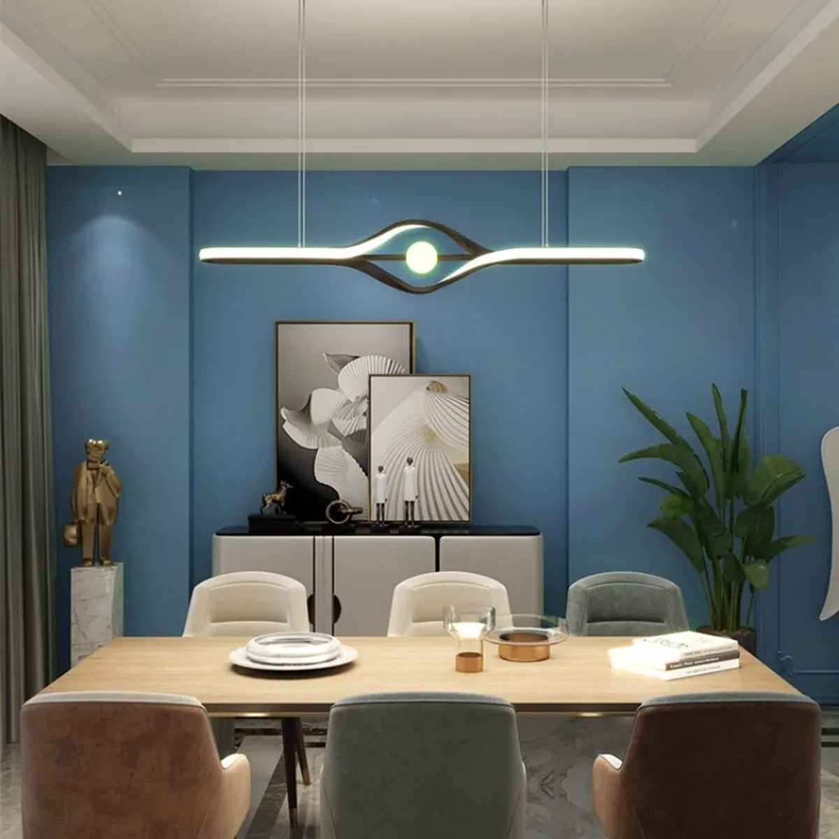 Ondara sinuous wave linear LED pendant light in blue dining room