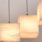 Rectalux alabaster stone cube pendant — lit detail