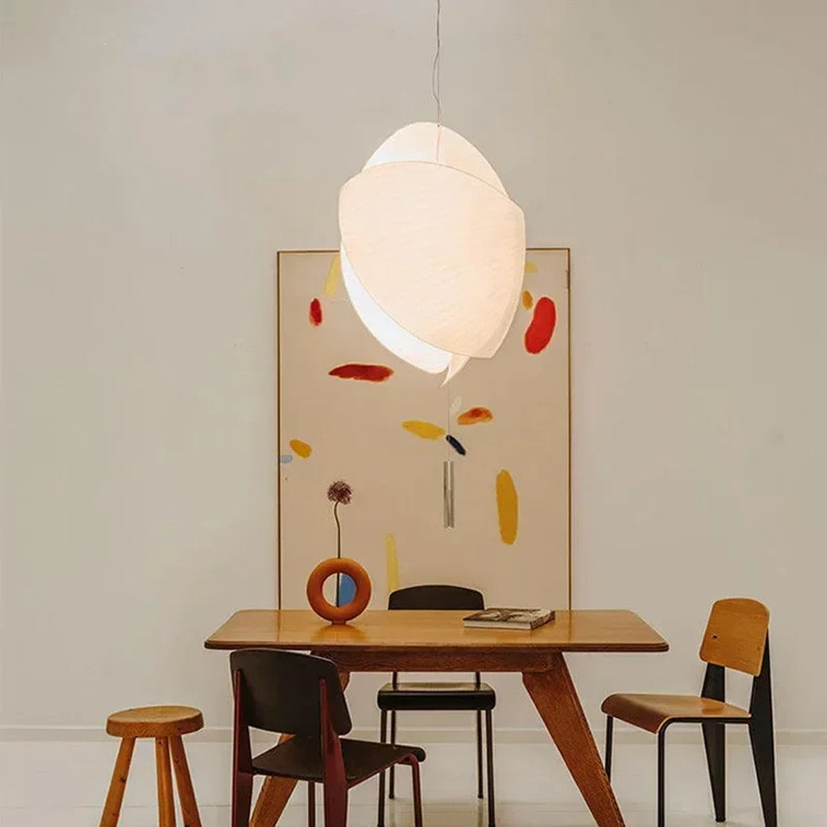 Corolla sculptural fabric pendant light — over dining table