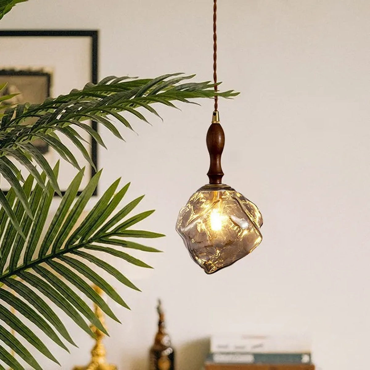Organic Crumpled Glass Pendant Light Tolux — Walnut Neck, glass glow among greenery