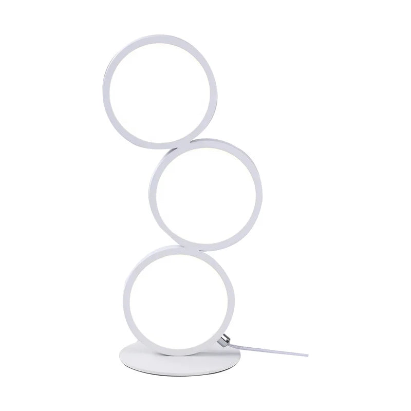 Circolia triple ring LED table lamp in Pure White, studio view