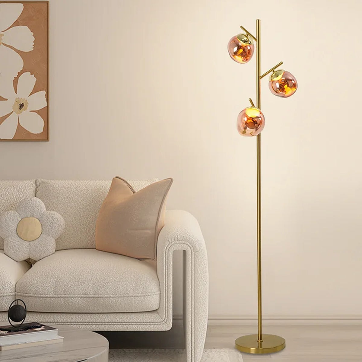Ambris sculptural brass branch floor lamp in a living room