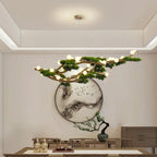 Veloris pine branch chandelier in a living room with wall art