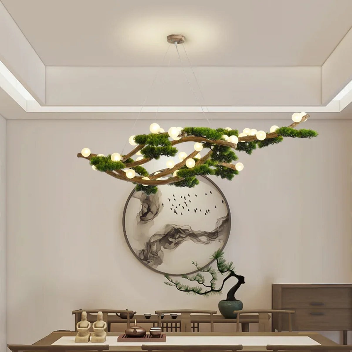 Veloris pine branch chandelier in a living room with wall art
