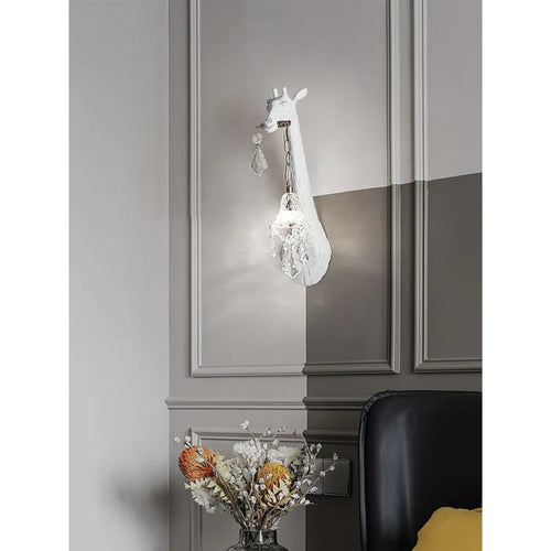 Serengeti giraffe wall sconce, white finish, styled interior wall — lifestyle