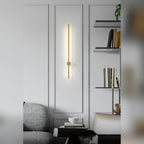 Adjustable Linear Aluminum Wall Sconce Luxara — living room lifestyle, brass finish