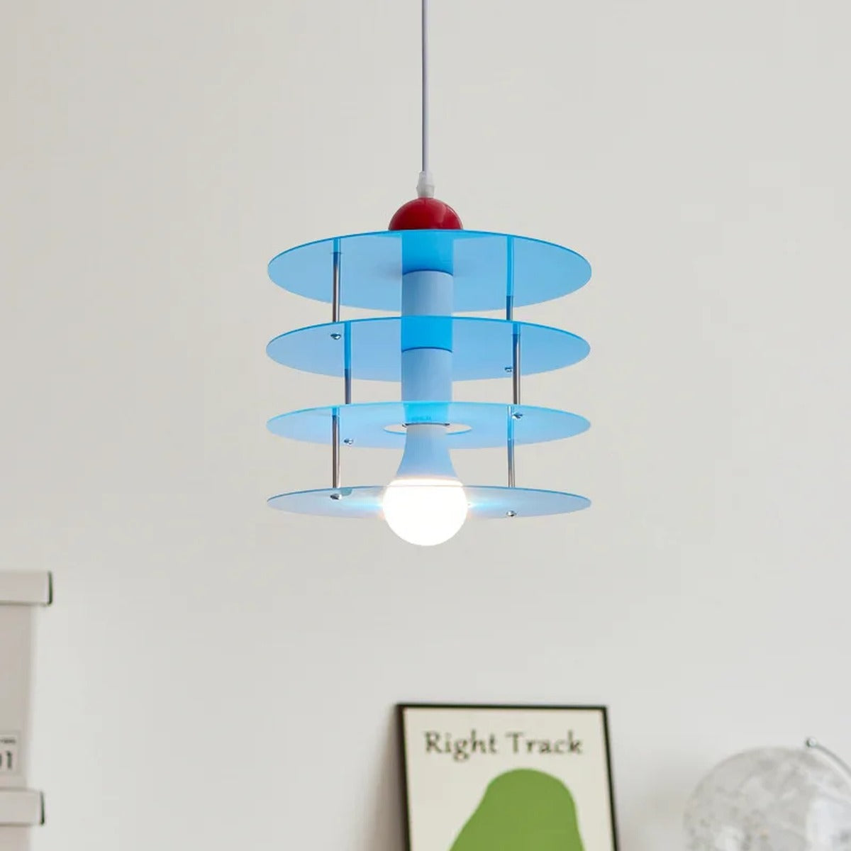 Stacked Acrylic Disc Pendant Light – Luminth – Blue, Lifestyle View