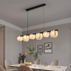 Alabaster Disc Linear Chandelier Torivax — dining room view