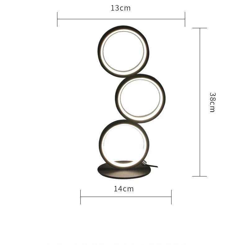 Circolia triple ring LED table lamp dimensions — 38 cm tall, 14 cm base, 13 cm ring width