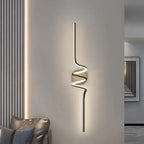 Vireth sculptural ribbon LED wall sconce — staircase, lifestyle view