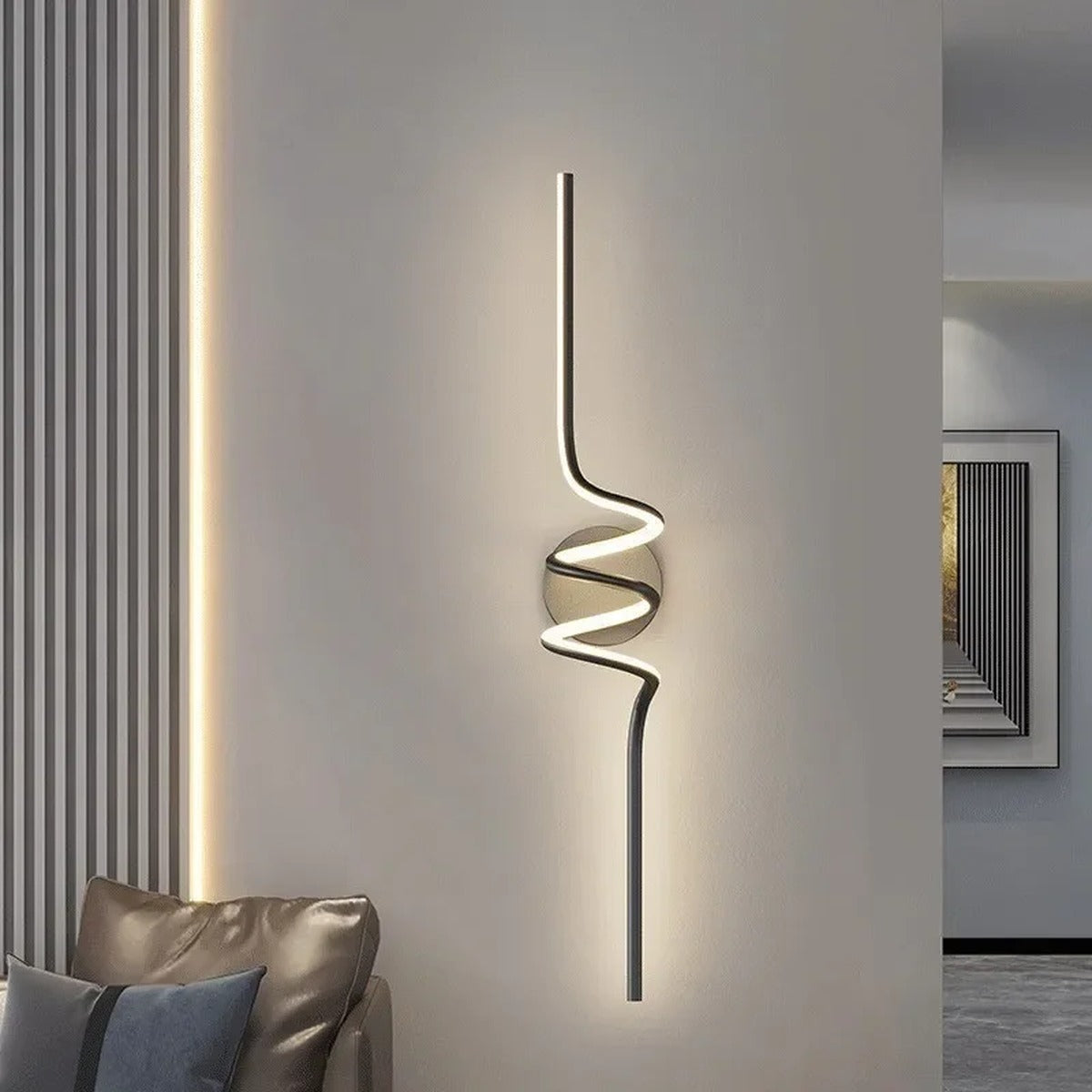 Vireth sculptural ribbon LED wall sconce — staircase, lifestyle view