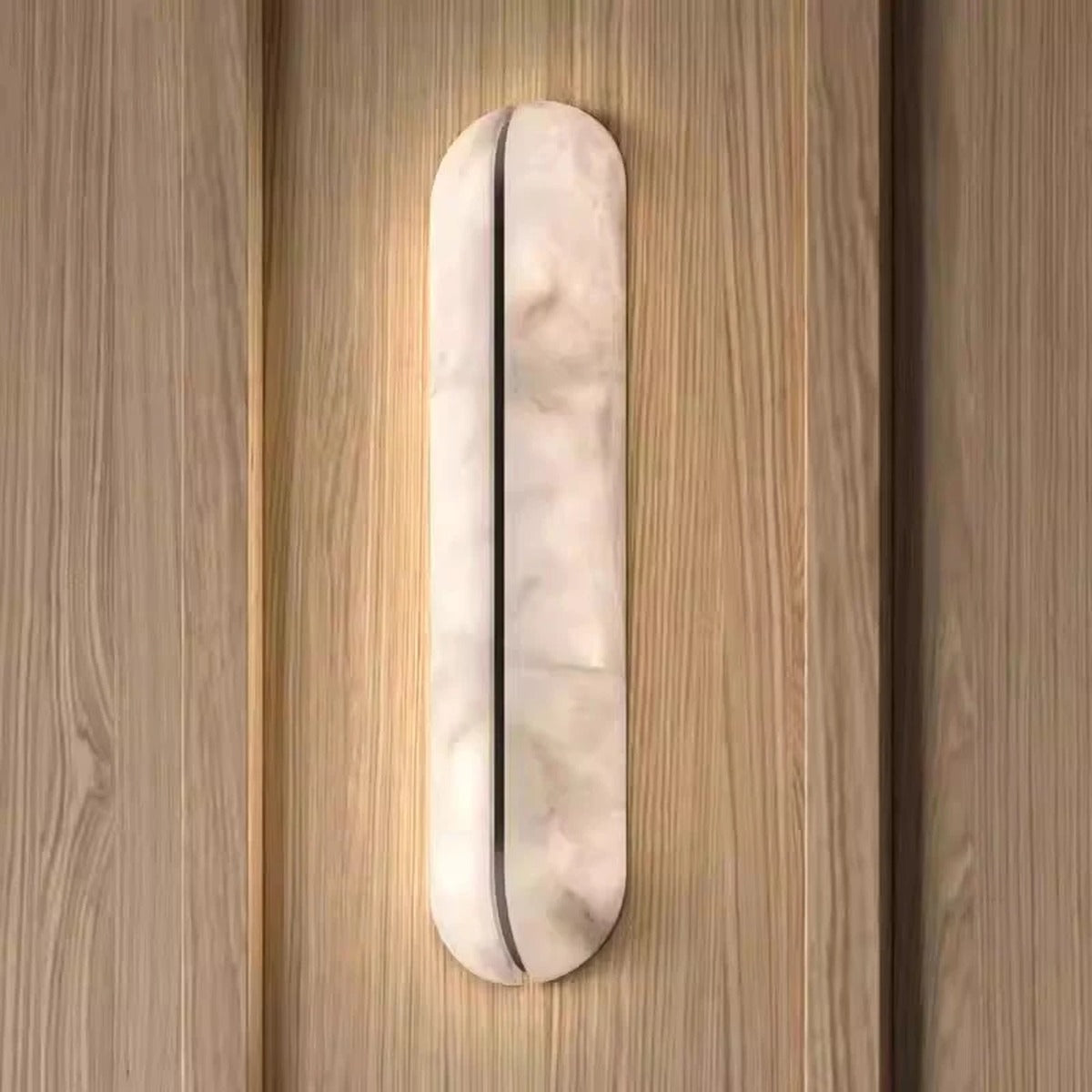 Jenova — pair of gold 65cm sconces flanking bed as bedside lighting