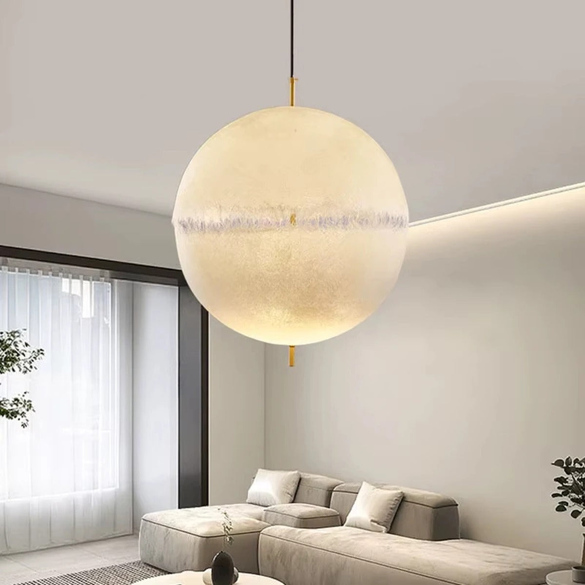 Lunaro Moon Chandelier in a warm living room