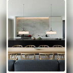 Slender Stem Flat Drum Pendant Light – Walvorn – lifestyle over a marble kitchen island