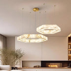 Orivex hexagonal alabaster pendants, shown as a duo, above a living room sofa