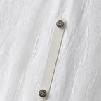 Tenzora wall sconce shade close-up, textured resin finish