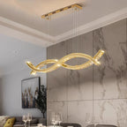 Cerlon crystal linear pendant, 100cm size, above a marble-walled dining room