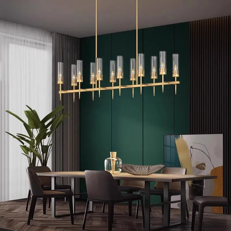 Statement brass linear chandelier with fluted glass shades above a dining table – Cernova