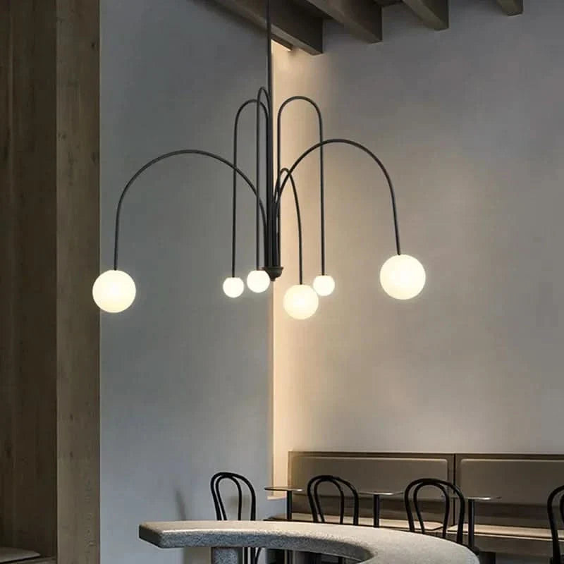 Sculptural Steel Arched Globe Chandelier Aurion – Lifestyle View 4