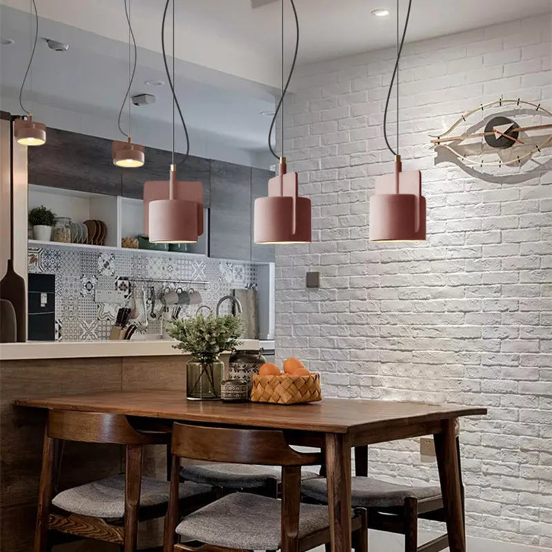 Nordic Industrial Geometric Pendant Light Kvaelindra – Vermilion Red over a dining table
