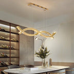 Cerlon crystal linear pendant, 120cm size, above a dining table with wine display