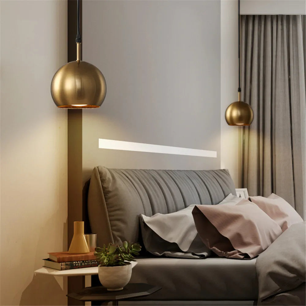 Solindra lamp – single pendant over marble console with sculptural object