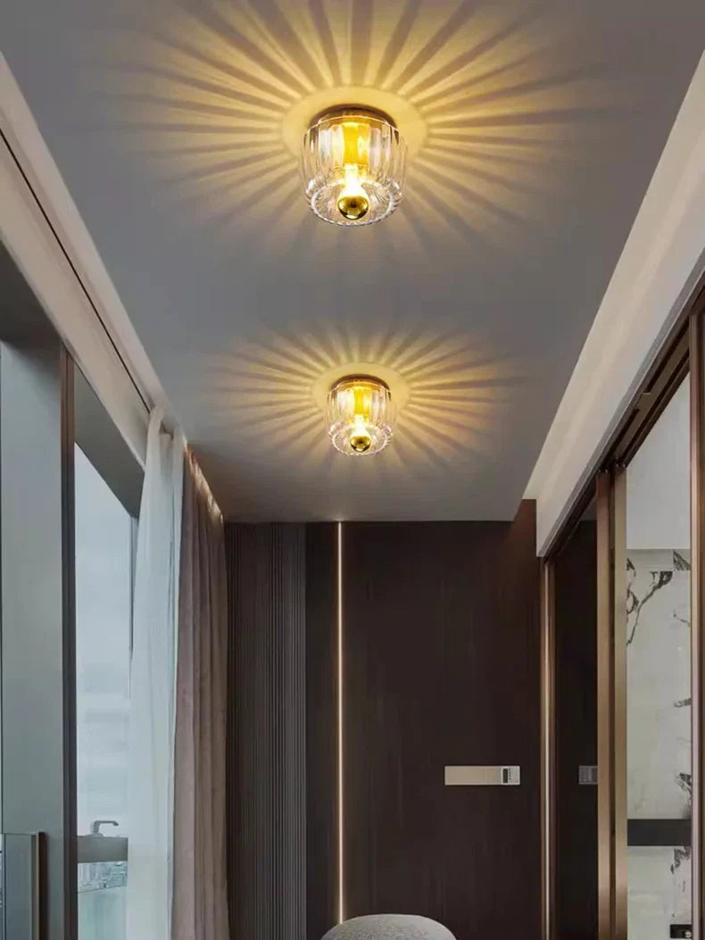 Fluted Glass Sunburst Wall Sconce Calnox – Gold Finish Lifestyle