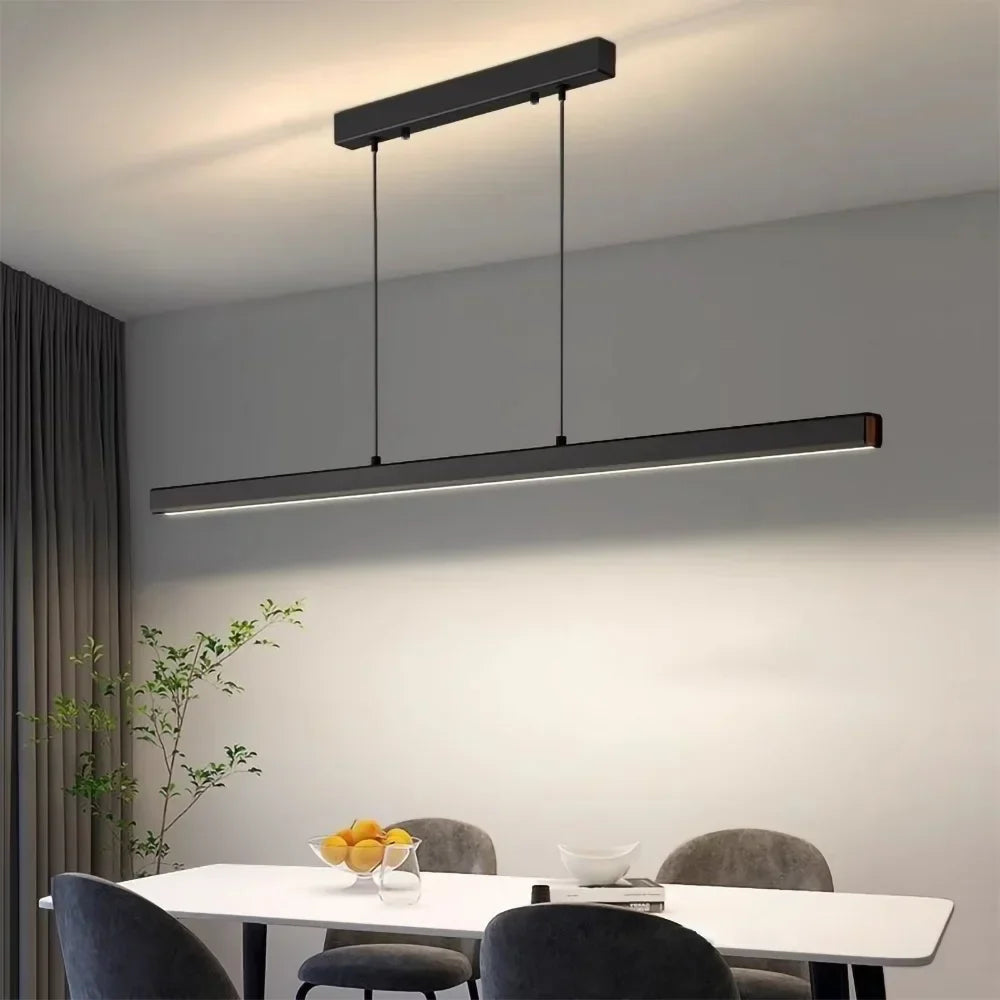 Sculptural Linear Metal Pendant Light Velthor – Dining Room with Wood Accent Detail