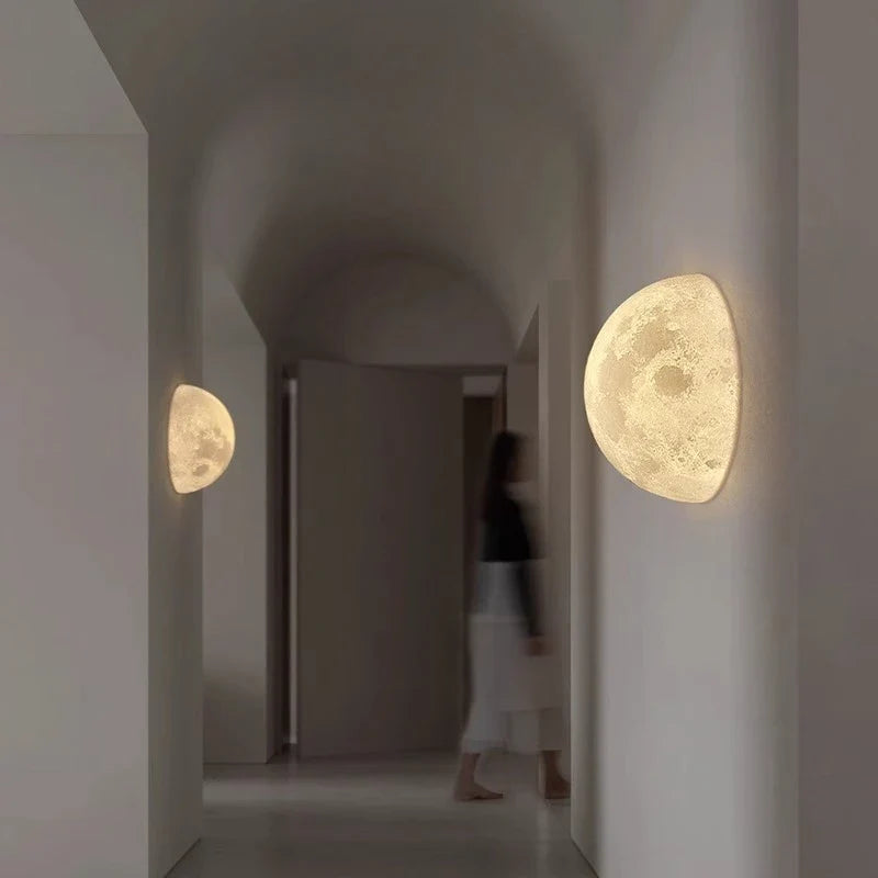 Selenya Hemisphere and Whole Sphere wall sconces lit in a hallway