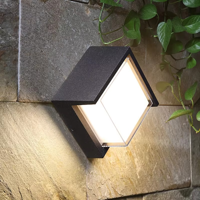 Minimalist LED Square Outdoor Wall Light Lumaire - close-up on stone wall