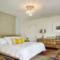 Cletya Gold Crystal Semi-Flush Ceiling Light Solora with faceted glass shades against white ceiling