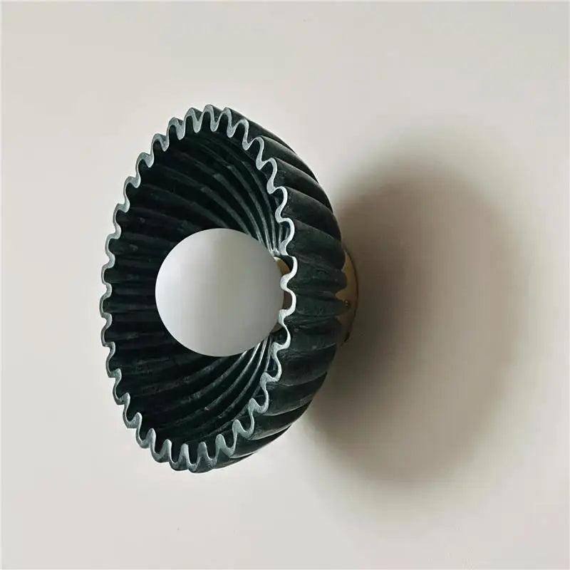 Sunburst Ridged Disc Wall Light – Hevorn – Green marbled ceramic, side profile lit