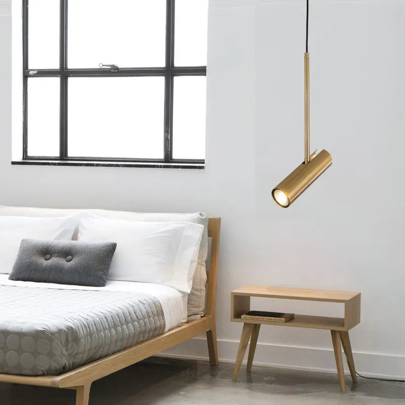 Polanthos solid brass pendant, bedroom lifestyle