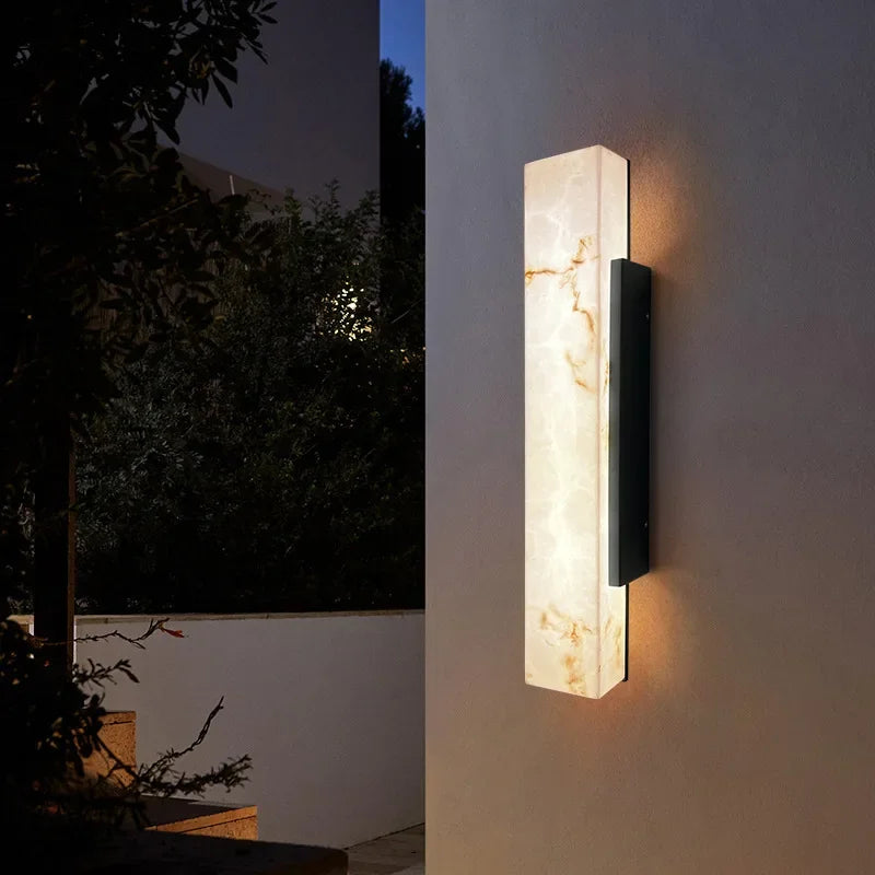 Faux Marble Sculptural Wall Sconce Eswyn – Outdoor Night Lifestyle