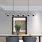Rotatable-Head Linear Spotlight Bar Chandelier Corvino – Lifestyle above kitchen table