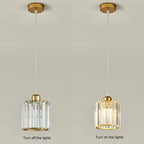 Nzaelion crystal cylinder pendant – on/off comparison, gold finish