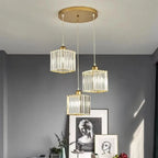 Ulindra 3-light crystal cluster pendant, Gold, round canopy with staggered drop