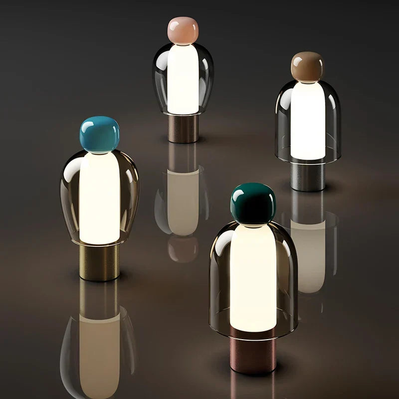 Harovant table lamp, all four finishes together