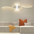 Sculptural Iron Wall Sconce Forlan – White Finish, Sofa Detail