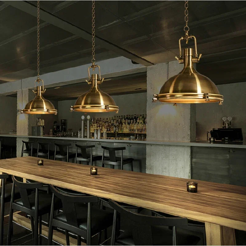 Industrial Metal Dome Pendant Light Cletyon - Gold Bronze Finish, Restaurant Bar Setting