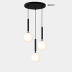 Modern Glass Globe Pendant Light Hovrix - Cascading Trio (Ø35cm), Black & Frosted Glass