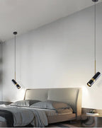 Polanthos black and gold pendant pair, bedside lifestyle
