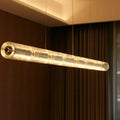 Cristellon crystal tube pendant – warm amber glow in luxurious dark room