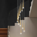 Prismex spiral cascade chandelier in Gold above a wood-toned staircase